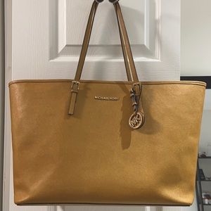 Michael’s Kors Hand Camel bag.